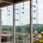 Why Glass Window Companies in Athens AL Use Engineered Mounting Systems